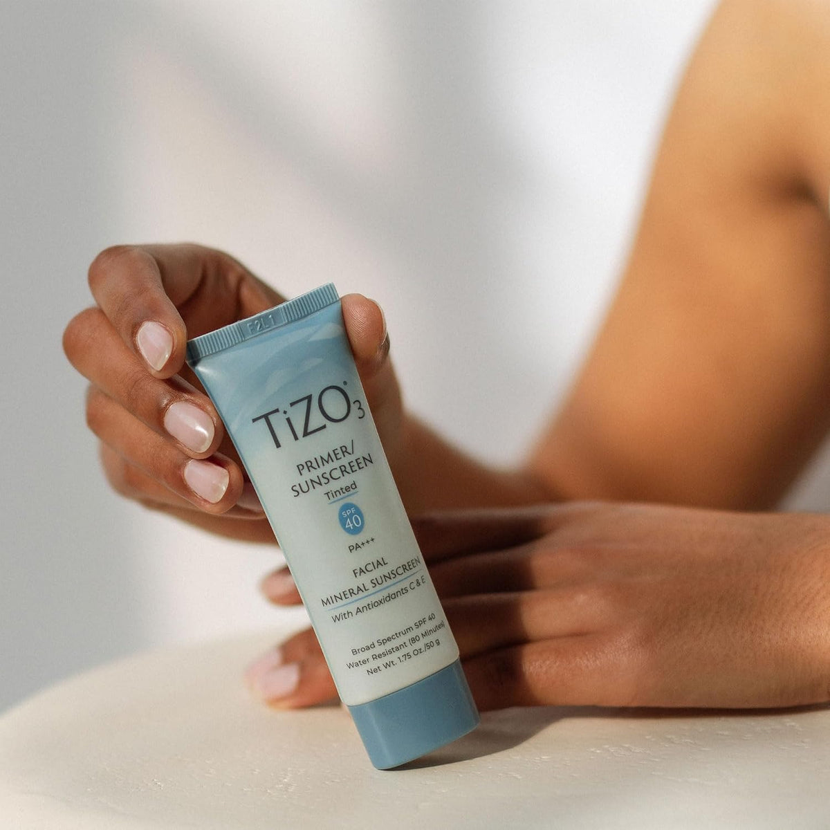 TiZO3 Facial Mineral Sunscreen and Primer, Tinted Broad Spectrum SPF 40..